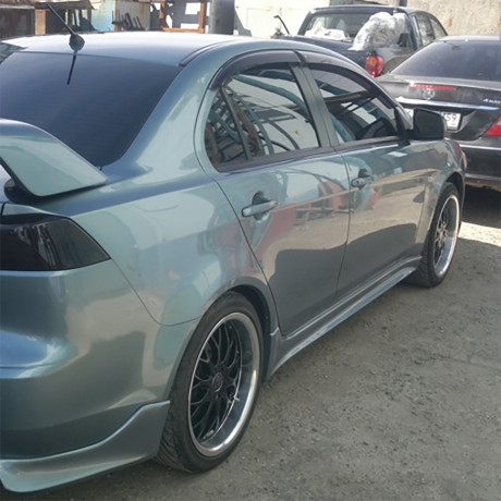 Накладки на пороги "Zodiak" для Mitsubishi Lancer X (2007-2016) купить недорого с доставкой в Тюмень