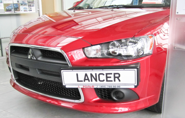Рамка под номер на передний бампер (текстурный пластик) для Mitsubishi Lancer X (2010-2016) купить недорого с доставкой в Тюмень