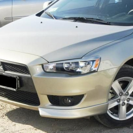 Клыки переднего бампера "Реплика" для Mitsubishi Lancer X купить недорого с доставкой в Тюмень